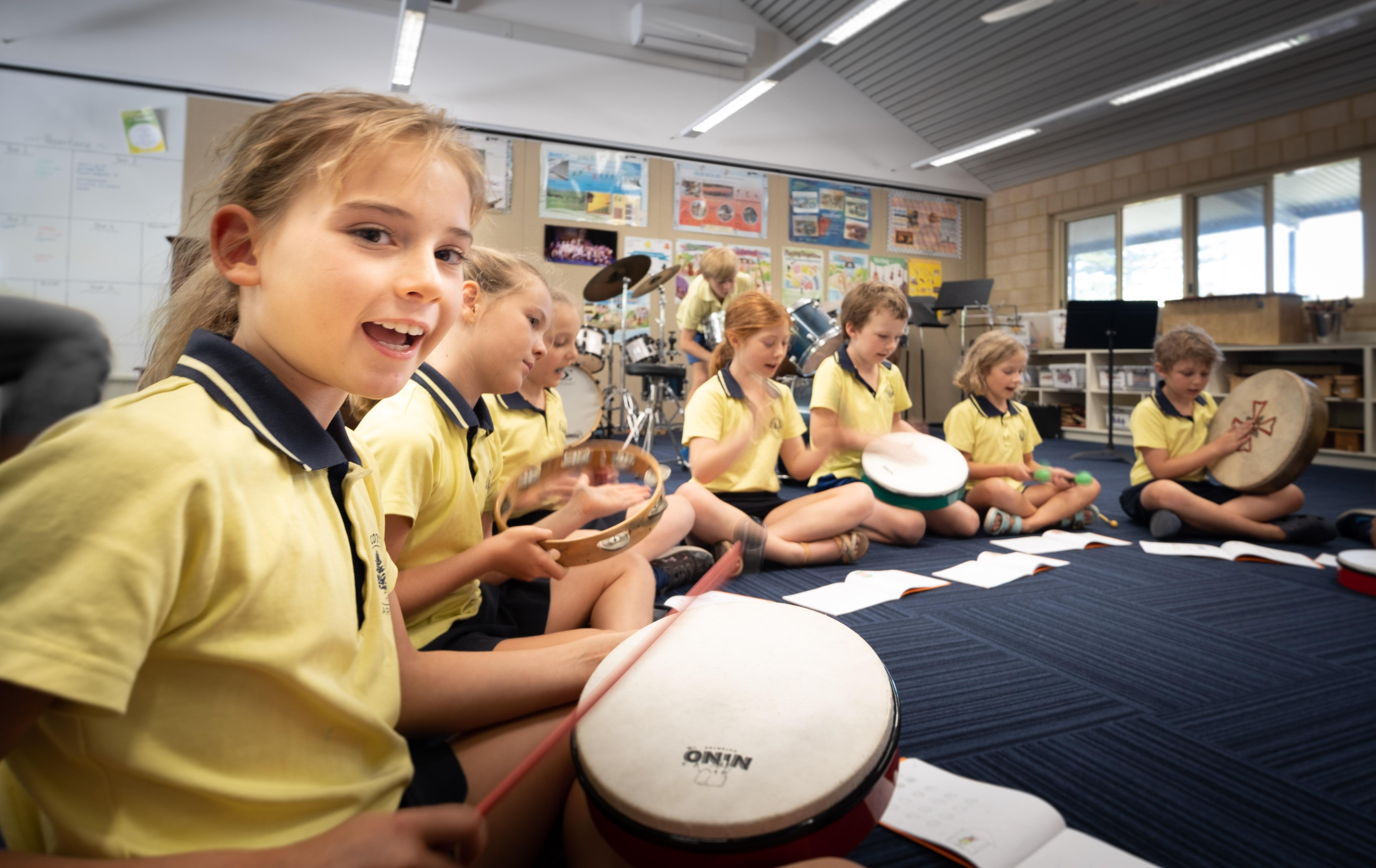 Students playing drums